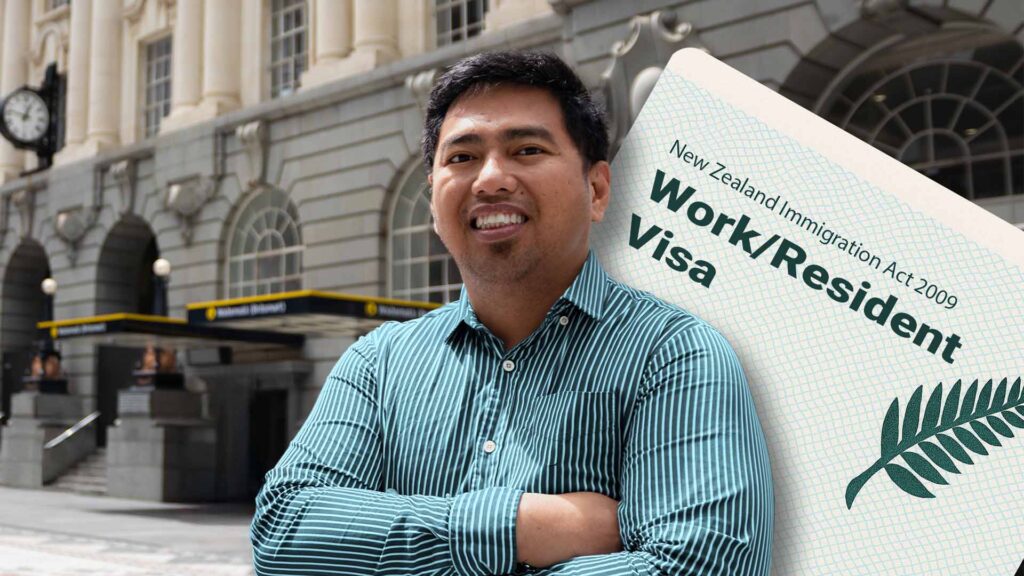 Man standing outside Britomart train station in Auckland representing a visa holder applying for a vehicle loan in New Zealand.